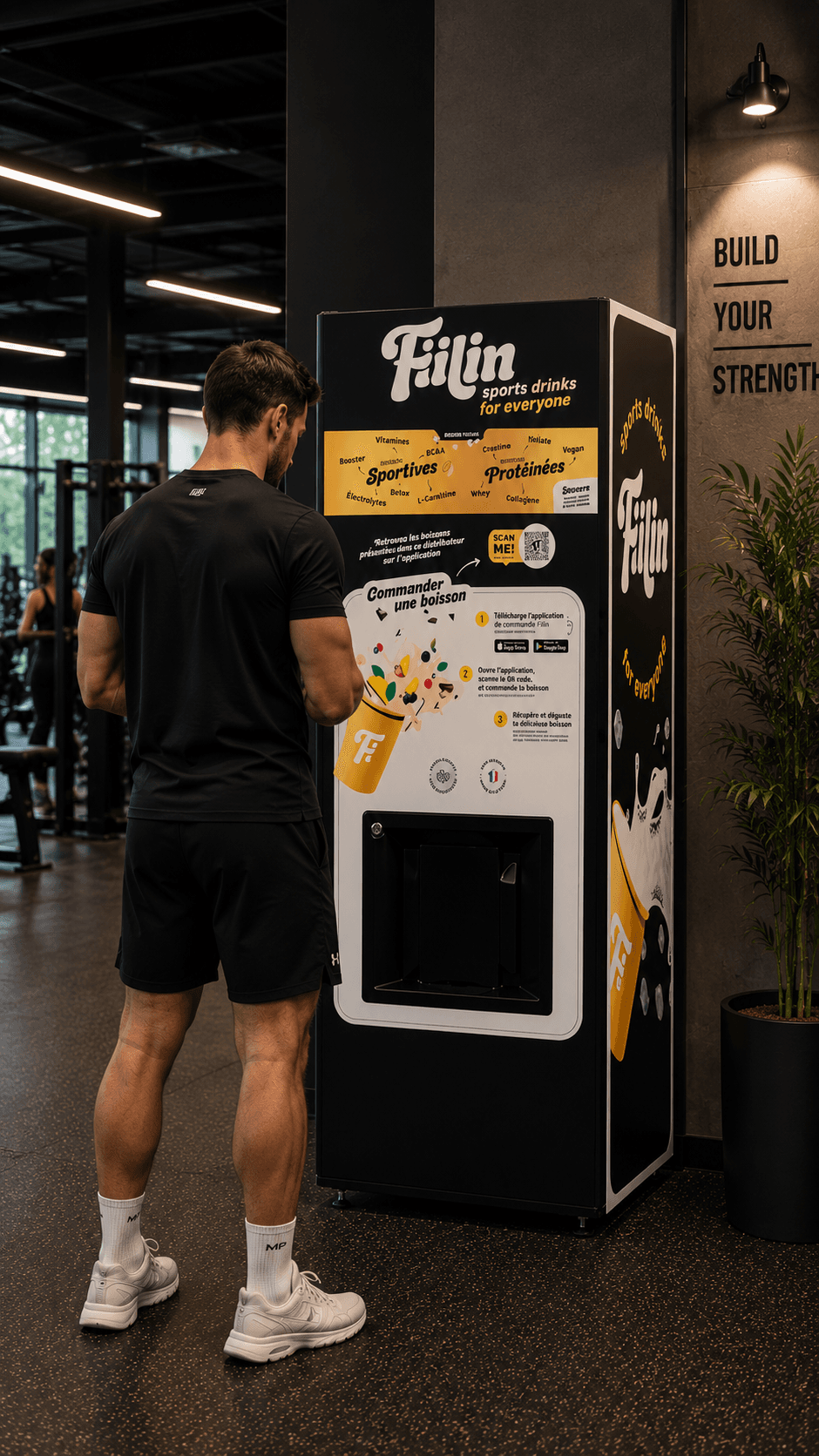 Distributeur Fiilin installé en salle, un adhérent en train de commander